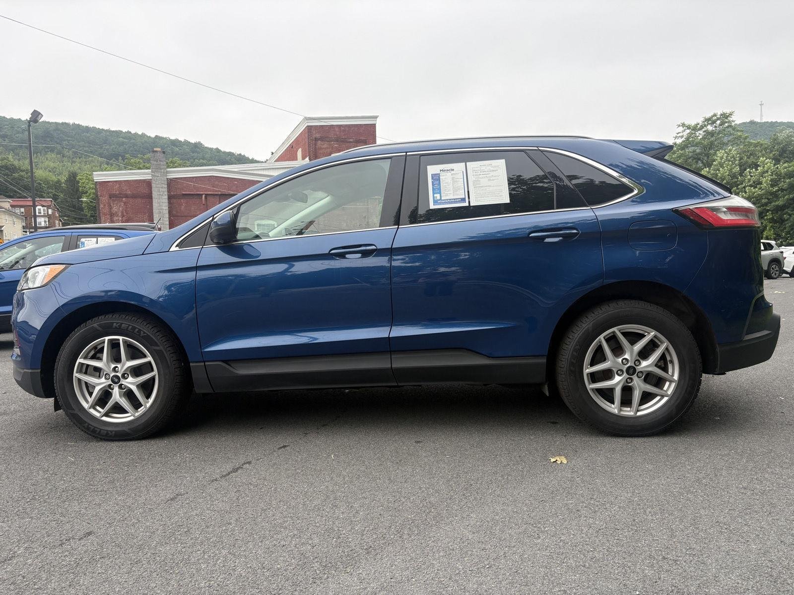 Used 2023 Atlas Blue Metallic FORD TRUCK SEL image 6
