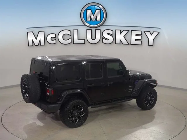 Used 2018 Black Jeep Unlimited Sahara image 4