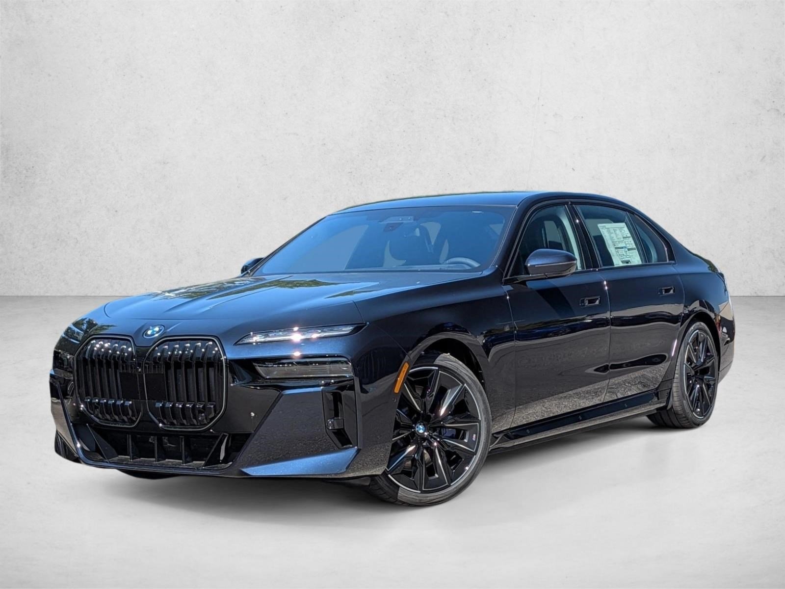Used 2026 Carbon Black Metallic BMW xDrive60 image 1