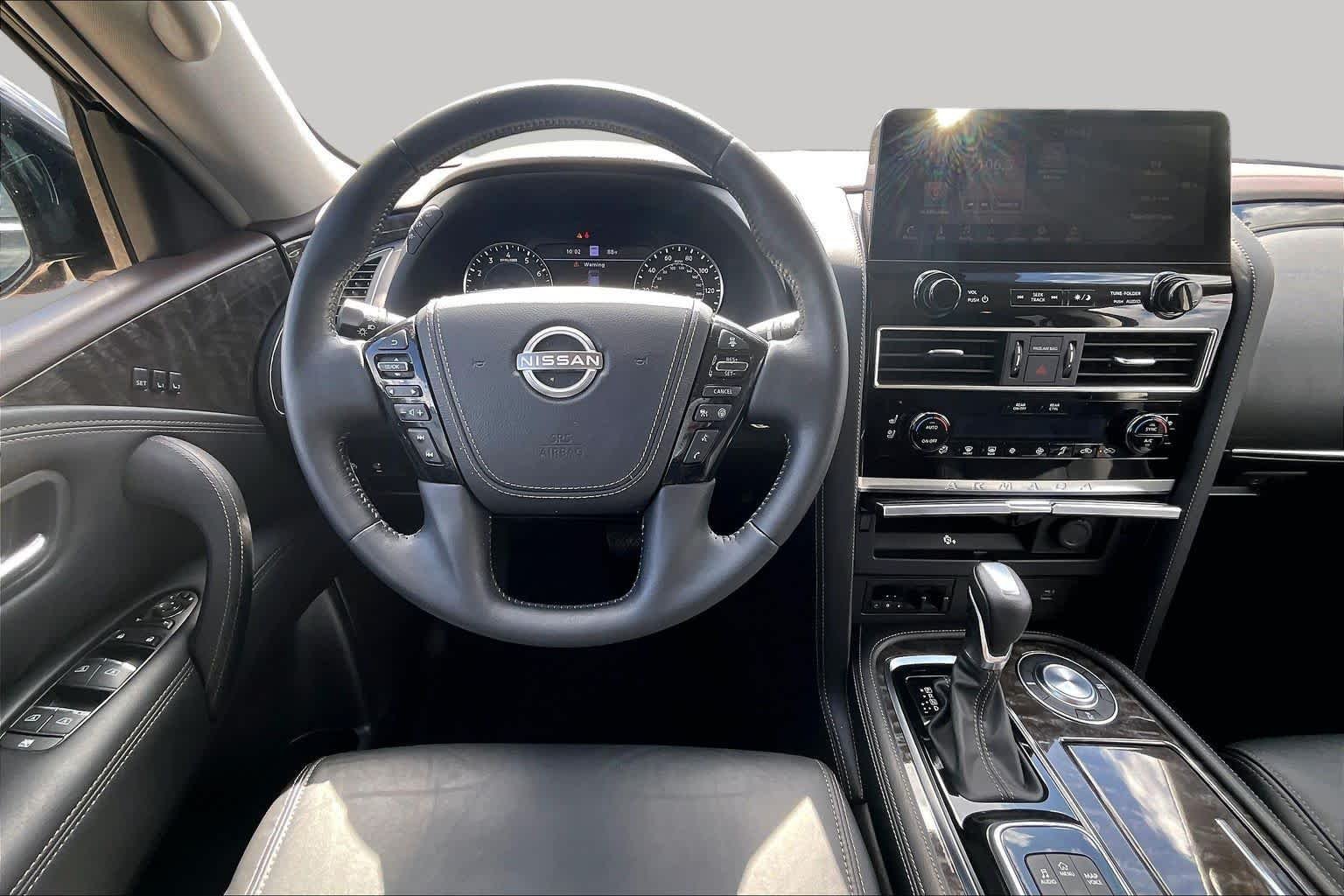 Used 2023 Super Black Nissan Platinum image 6