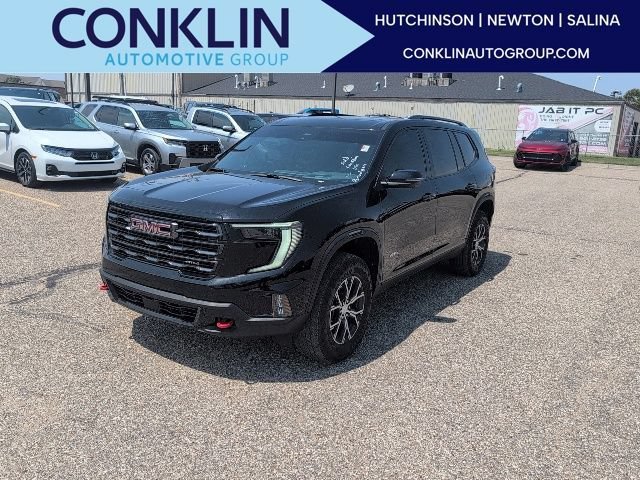 Used 2025 Ebony Twilight Metallic GMC AT4 image 1
