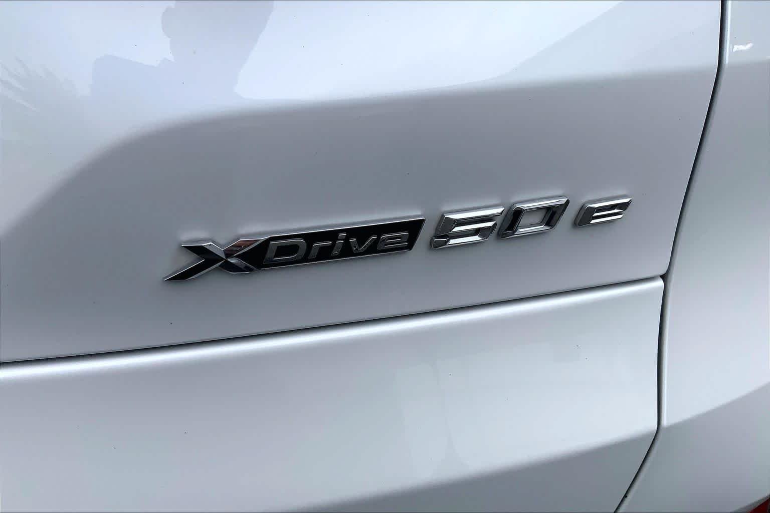 Used 2024 Mineral White Metallic BMW xDrive50e image 32