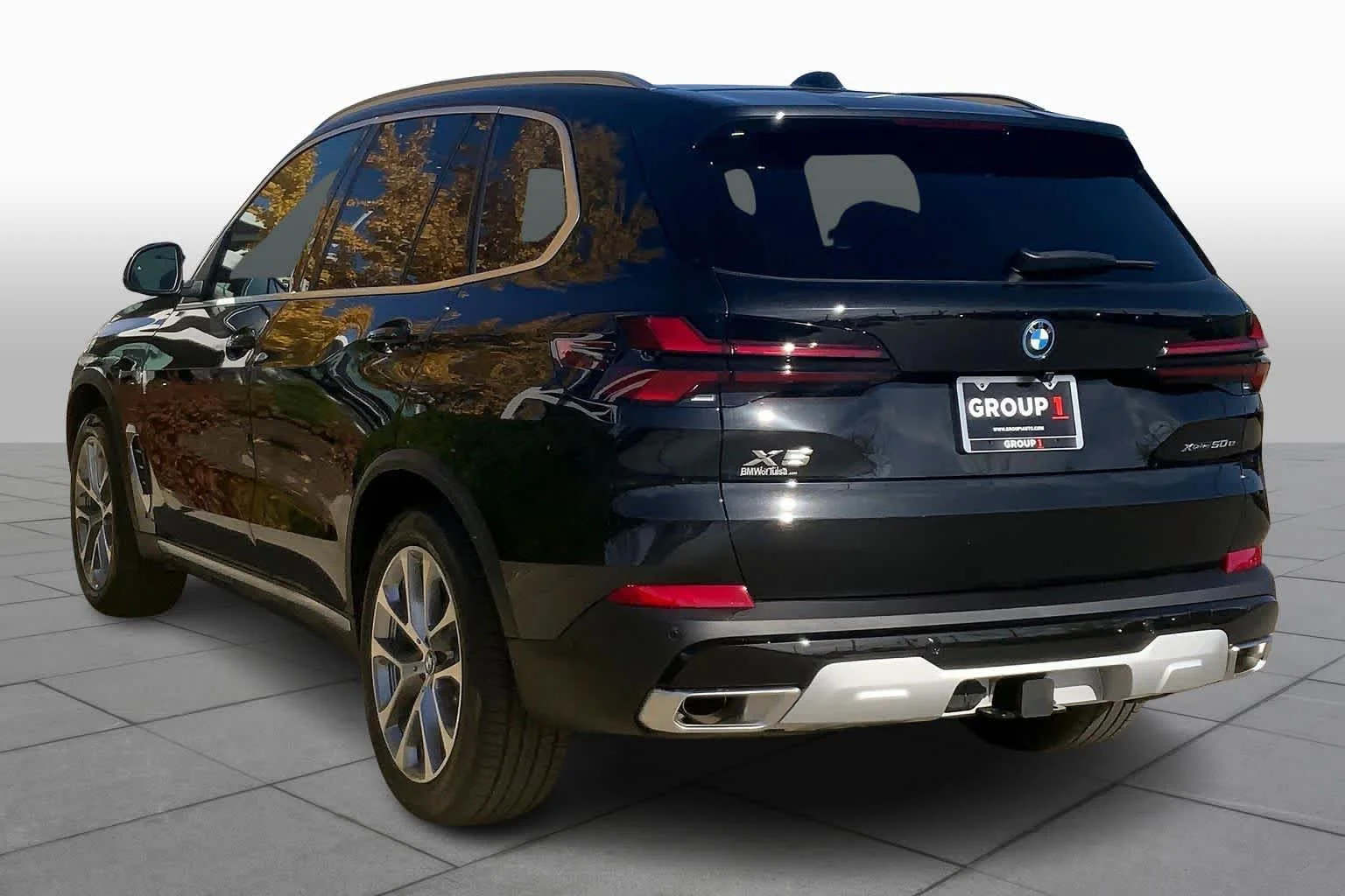 New 2026 Black Sapphire Metallic BMW xDrive50e image 11
