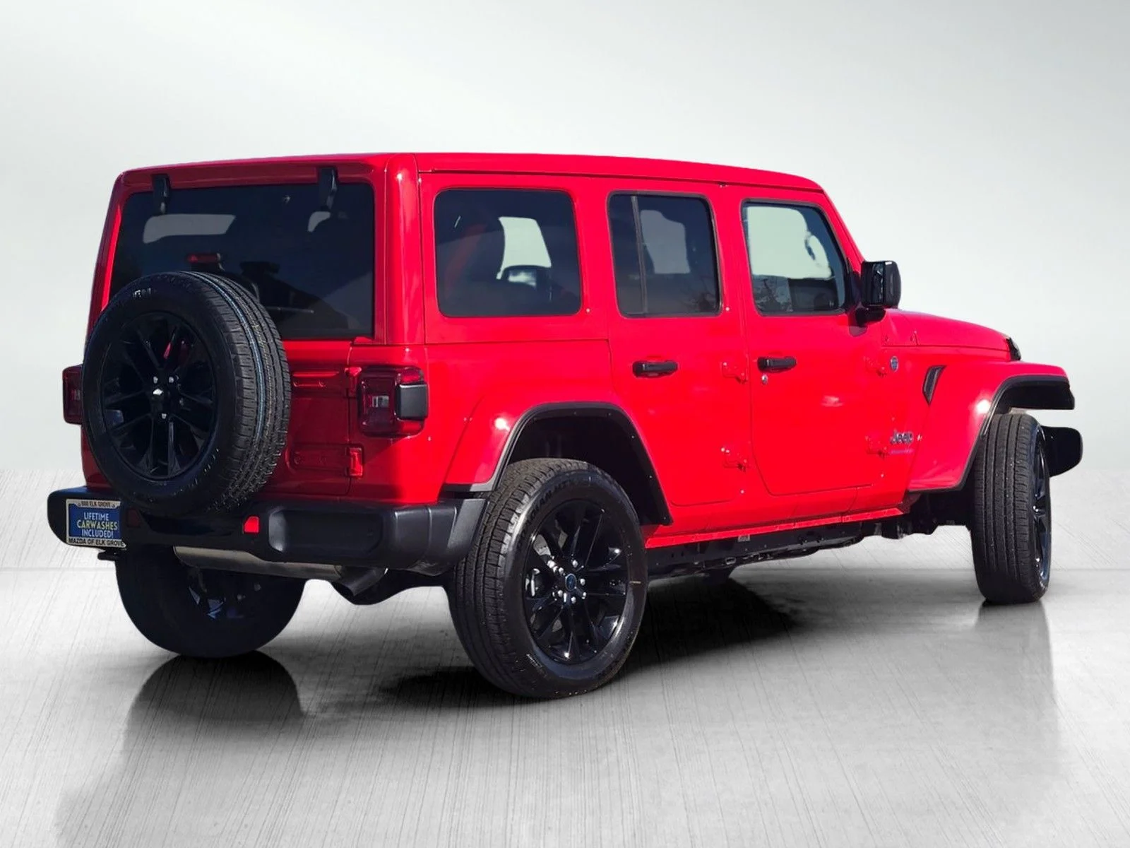 Used 2025 Firecracker Red Clearcoat Jeep Sahara 4xe image 4