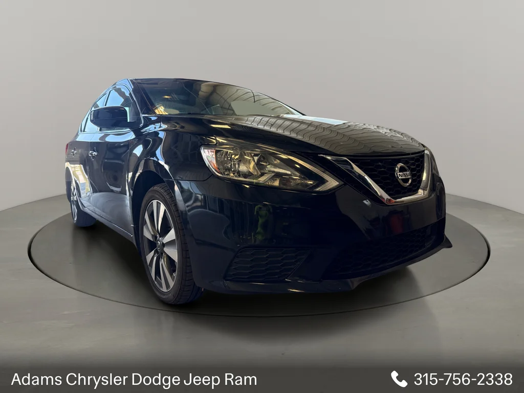Used 2019 Black Nissan SV image 1