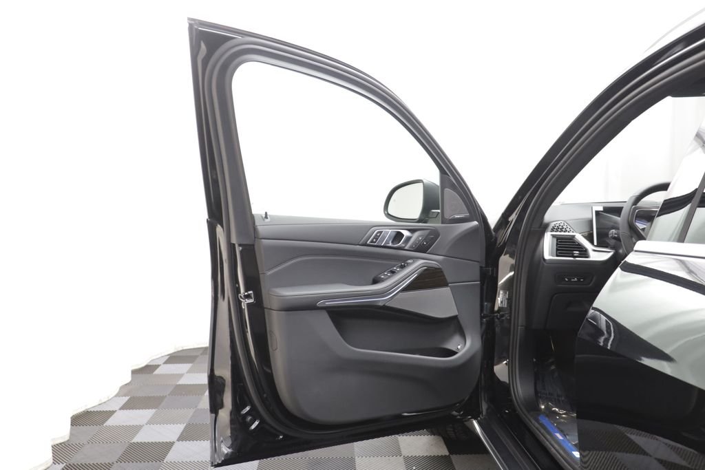 New 2026 Black Sapphire Metallic BMW xDrive50e image 6
