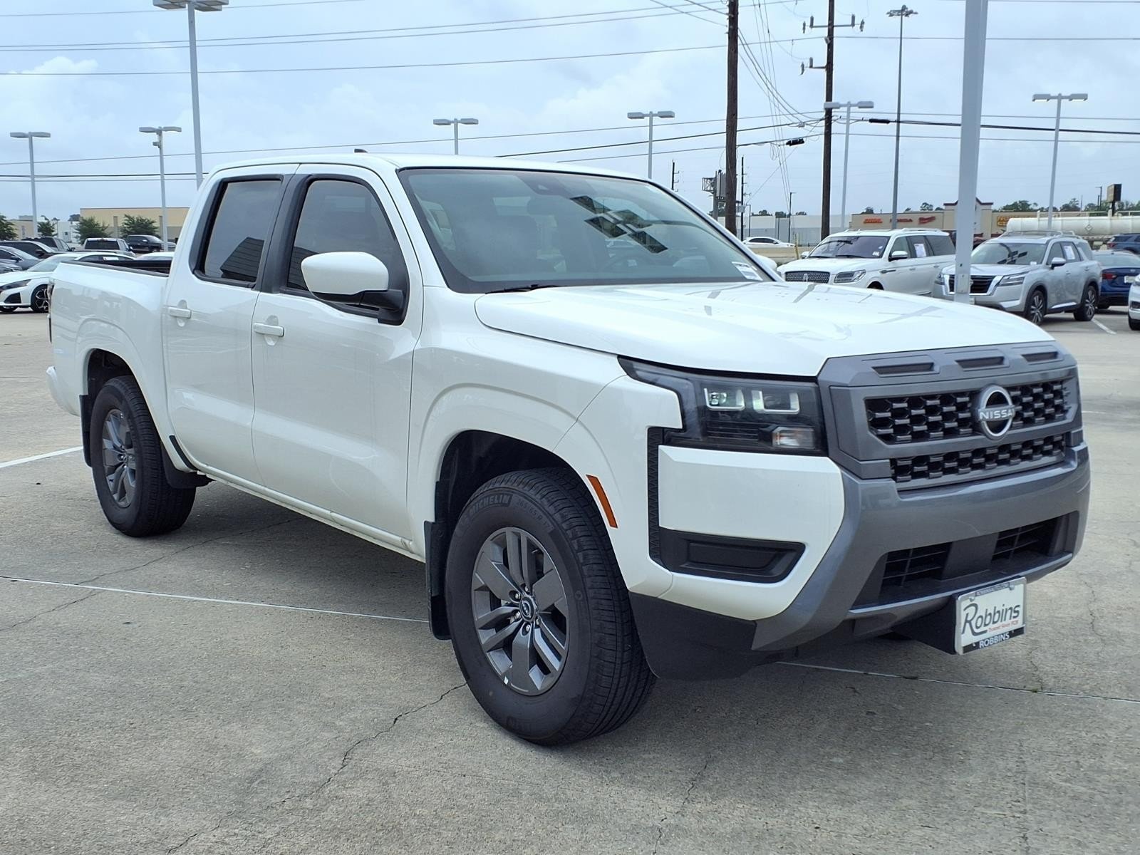 2026 Nissan Frontier SV White at Robbins Nissan