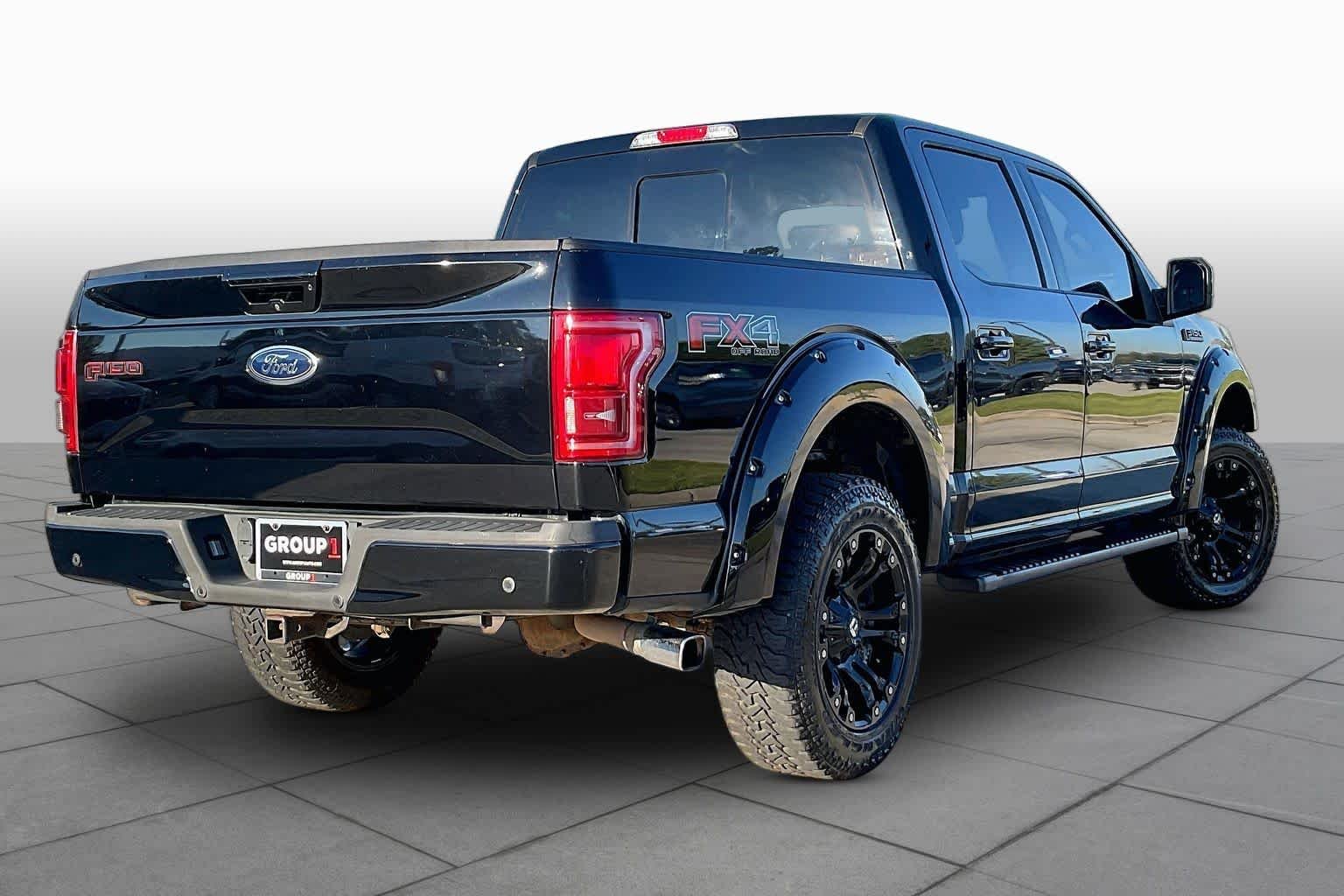 Used 2017 Shadow Black Ford Lariat image 13