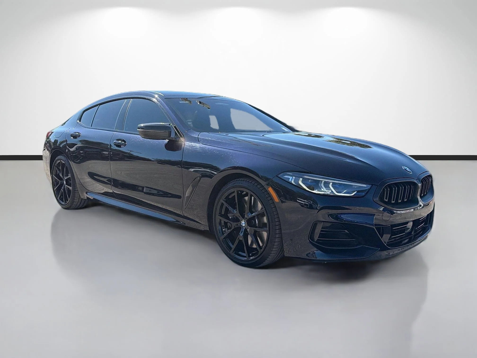 Used 2024 Carbon Black Metallic BMW M850i image 1