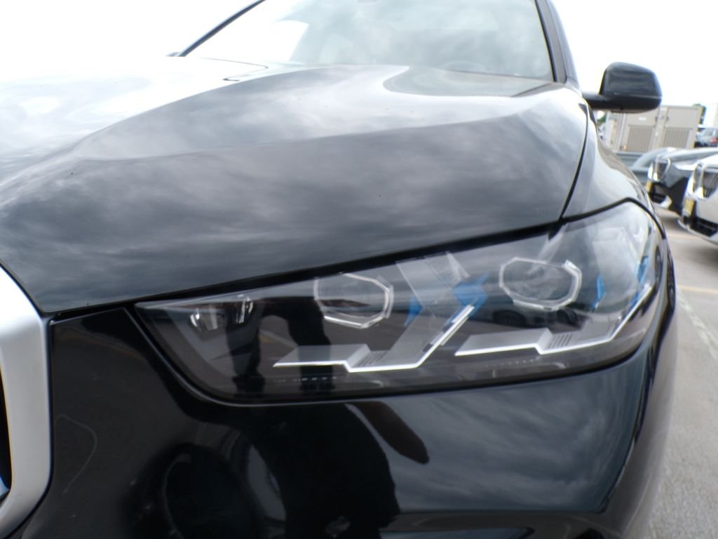 Certified Used 2024 Black Sapphire Metallic BMW xDrive40i image 9