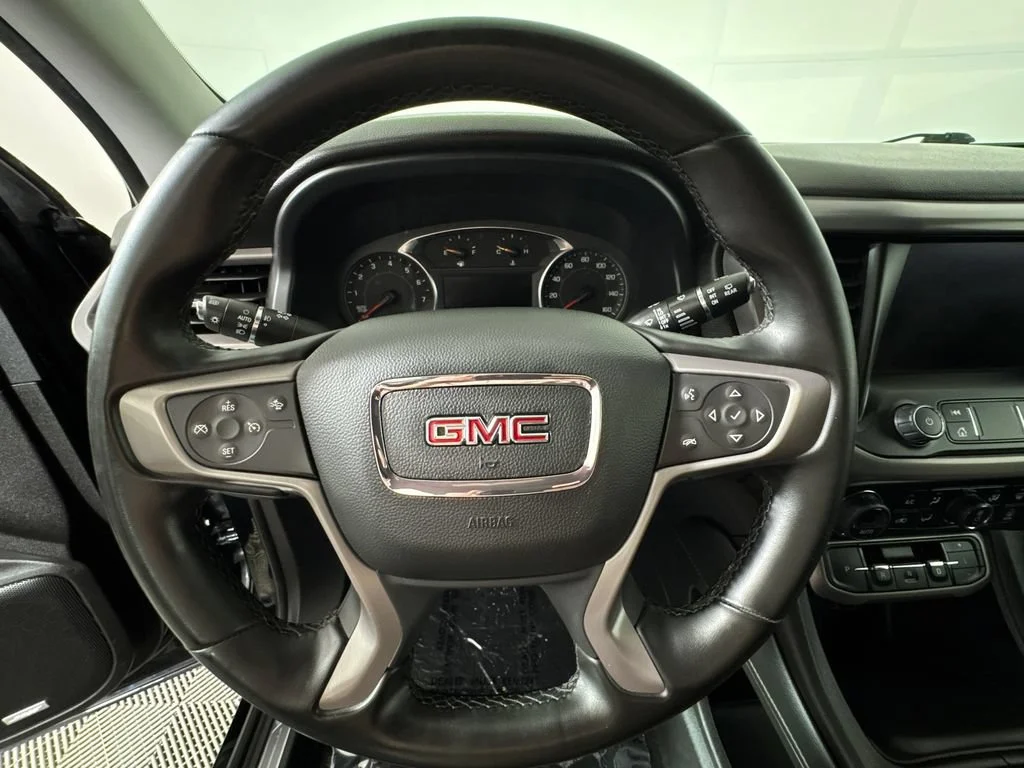 Used 2023 EBONY TWILIGHT METALLIC GMC AT4 image 32