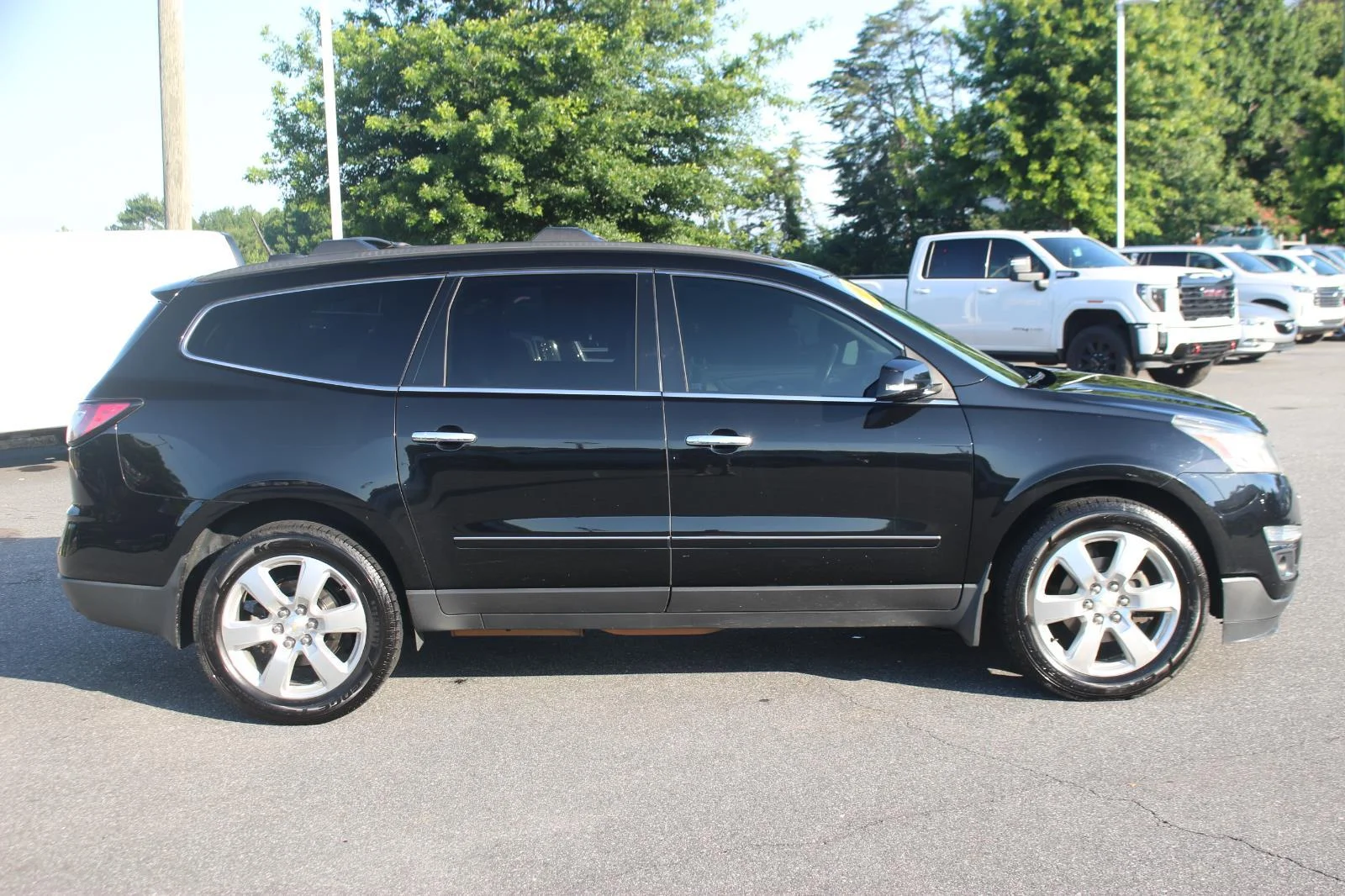 Used 2016 MOSAIC BLACK METALLIC Chevrolet LTZ image 8
