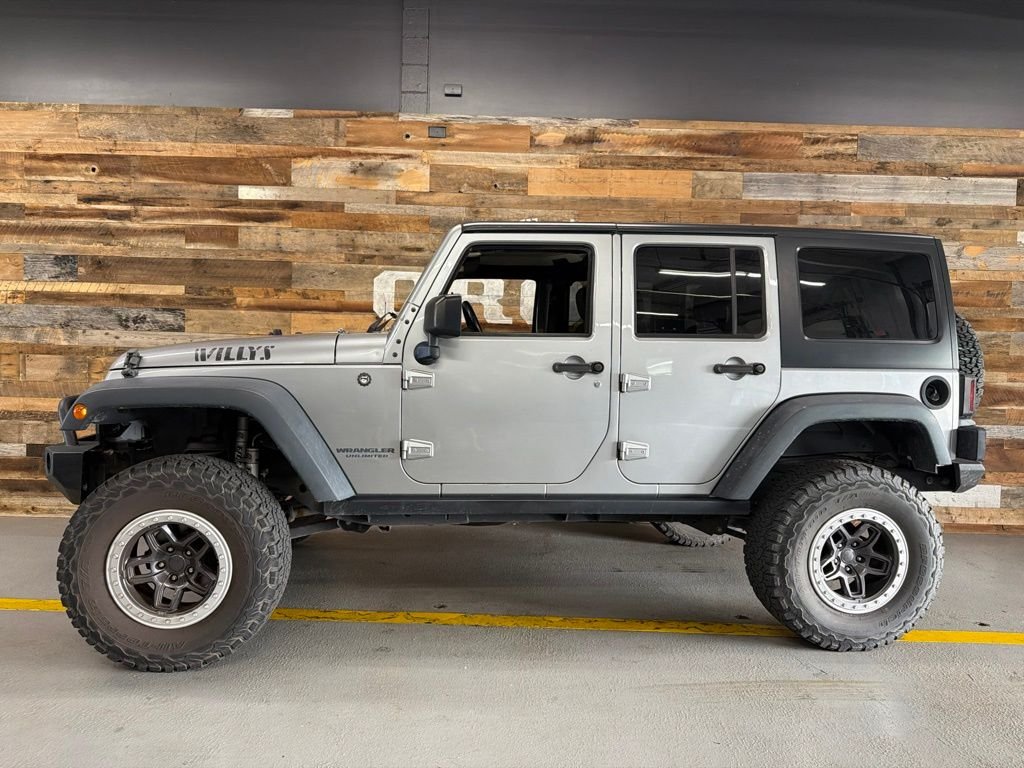 Used 2016 Billet Silver Metallic Jeep Unlimited Sport image 11