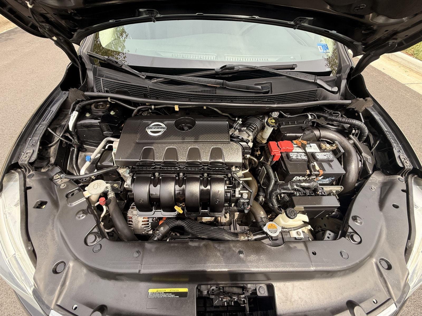 Used 2015 Super Black Nissan S image 11