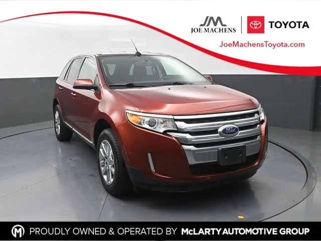 Used 2014 Orange Ford SEL image 1
