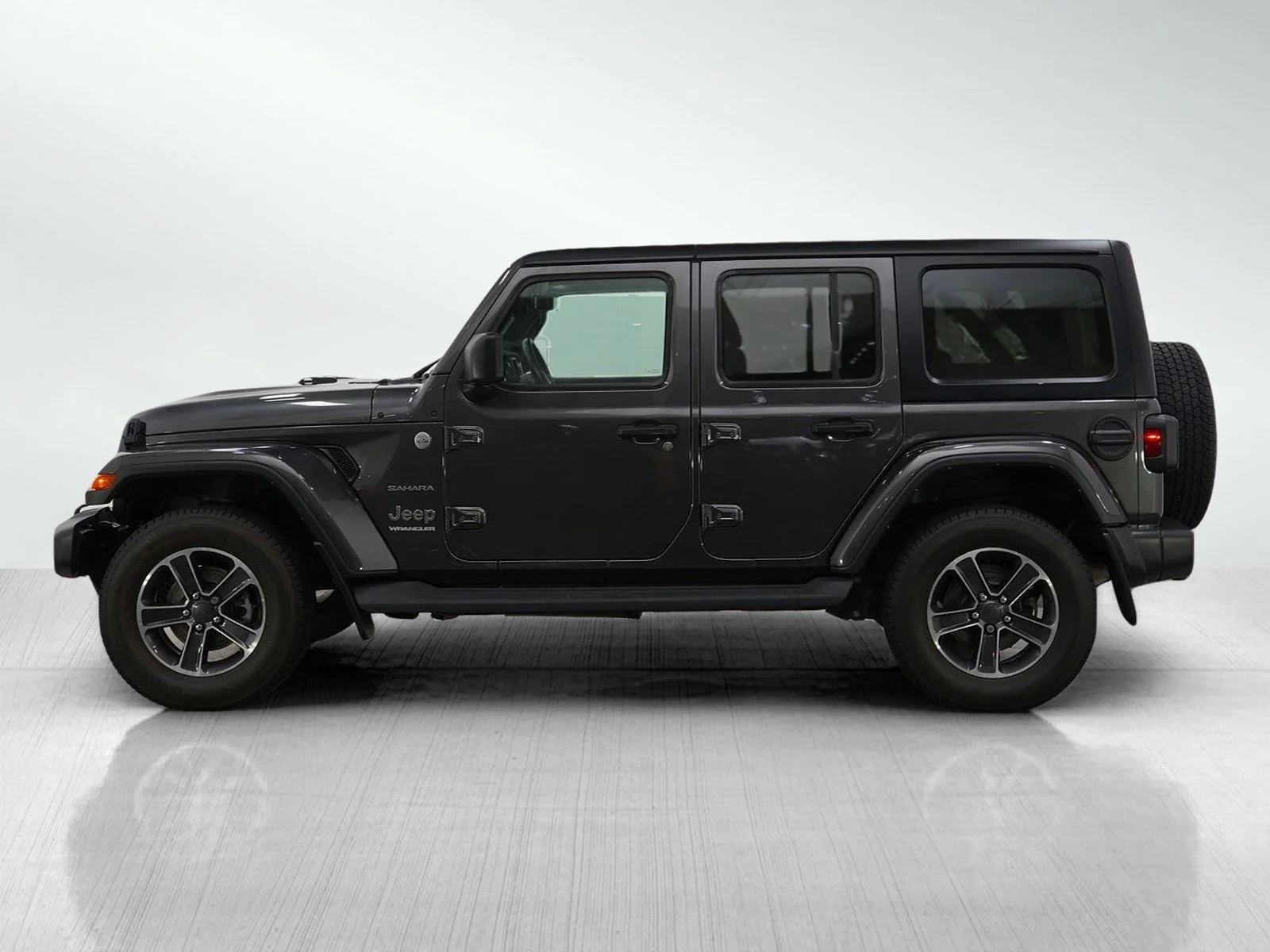 Used 2023 Jeep Wrangler 4-Door Sahara with VIN 1C4HJXEN1PW654574 for sale in Hopkins, Minnesota