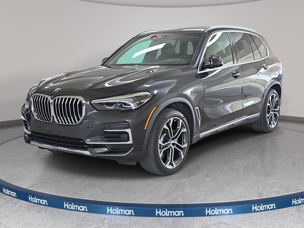 Certified Used 2023 Dark Graphite Metallic BMW sDrive40i image 1