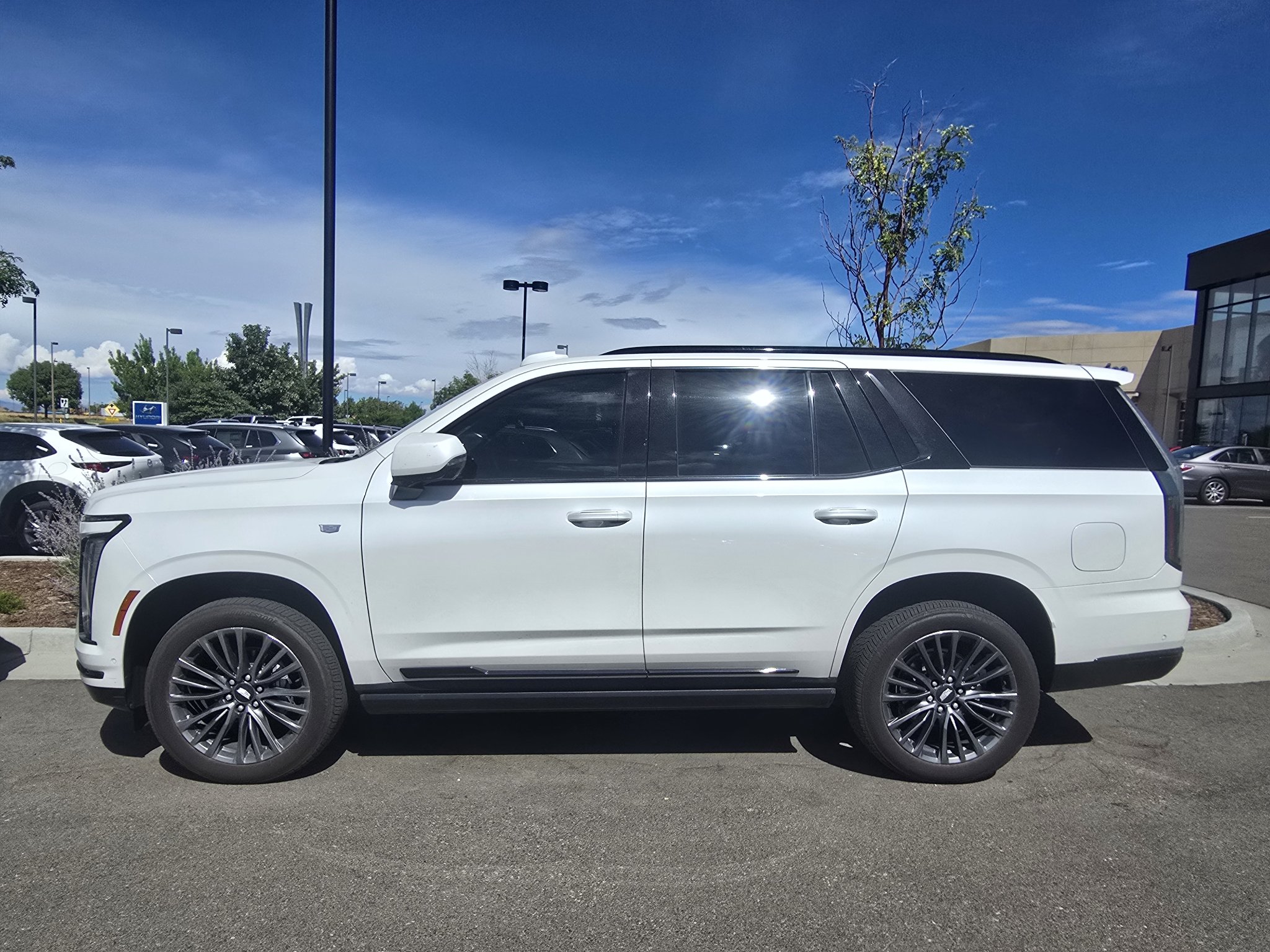Used 2025 Crystal White Tricoat Cadillac 4WD Sport Platinum image 2