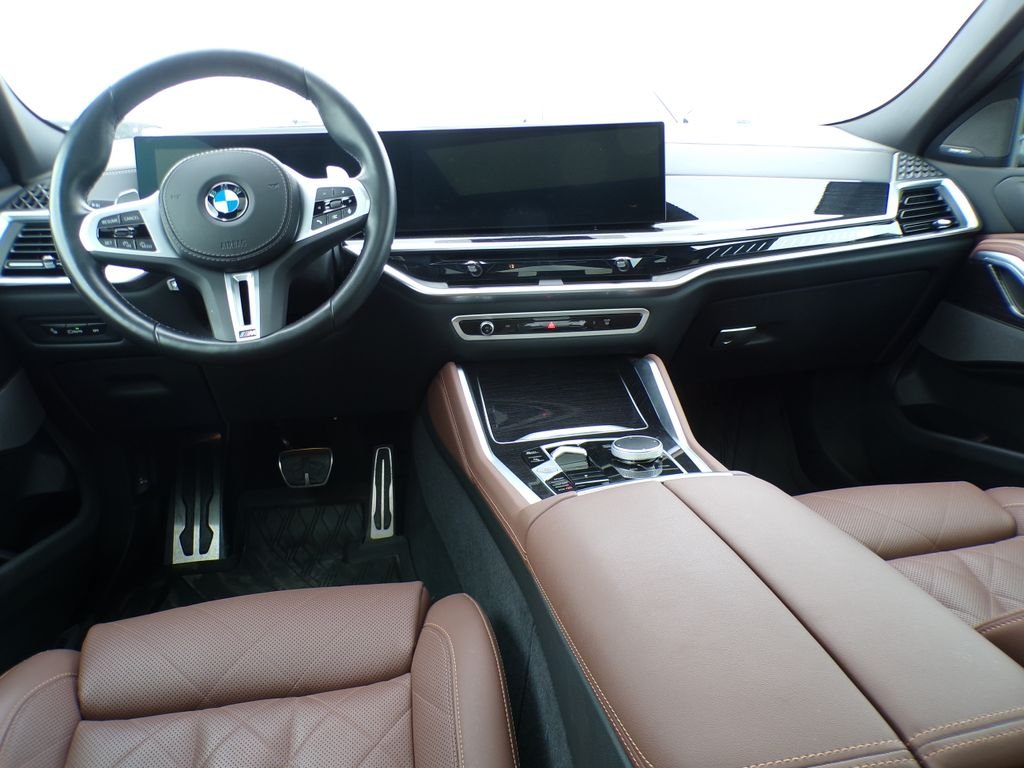 Certified Used 2024 Black Sapphire Metallic BMW M60i image 11