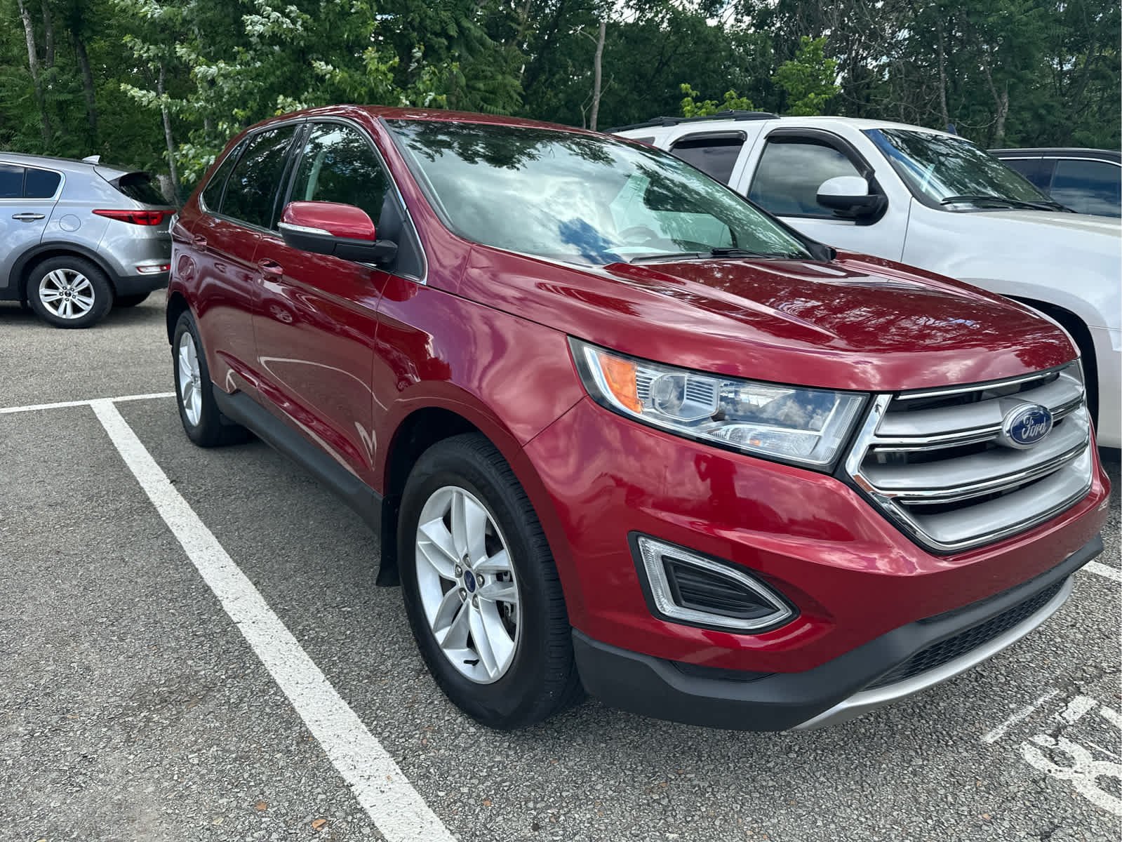 Used 2016 Ruby Red Metallic Tinted Clearcoat Ford SEL image 2