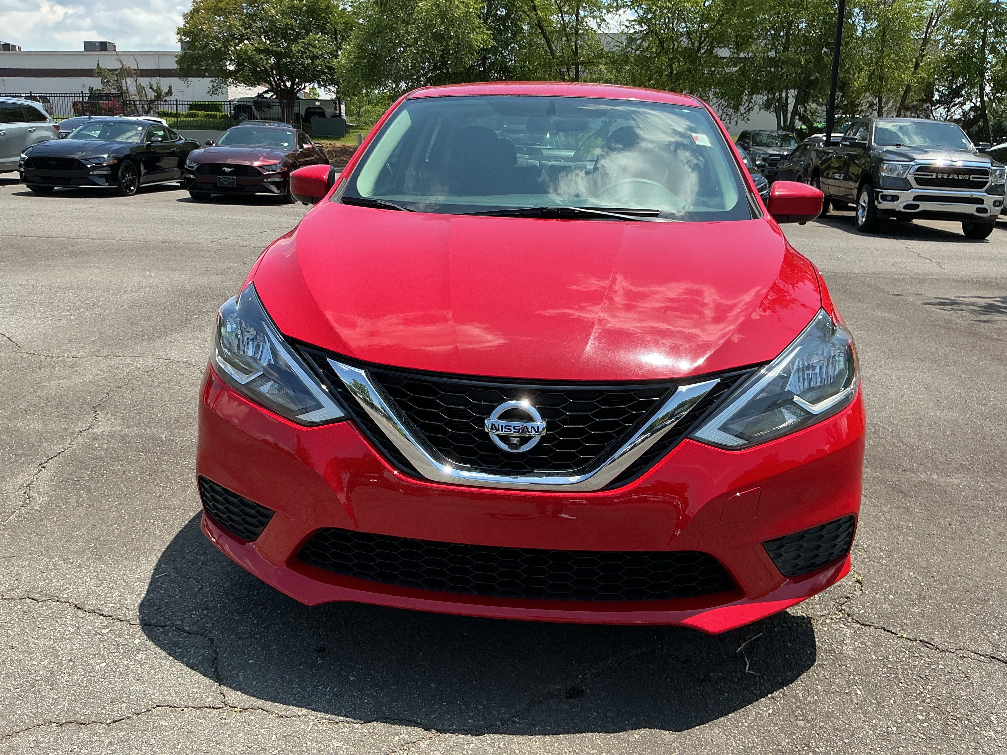 Used 2017 Red Alert Nissan SV image 6