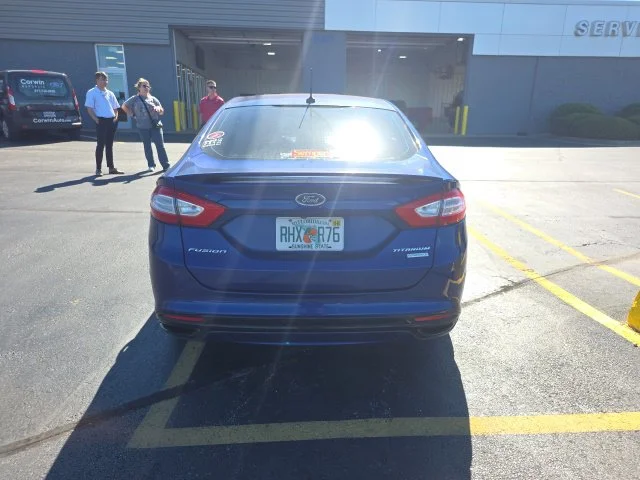 Used 2013 Blue Ford Titanium image 4