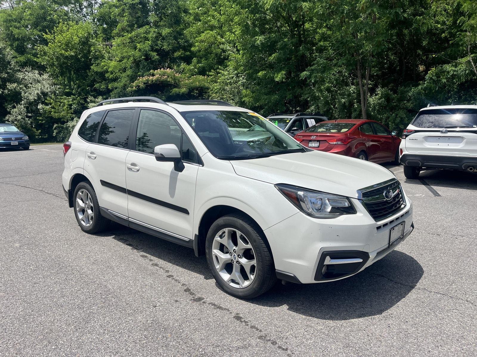 Used 2018 Crystal White Pearl Subaru Touring image 1