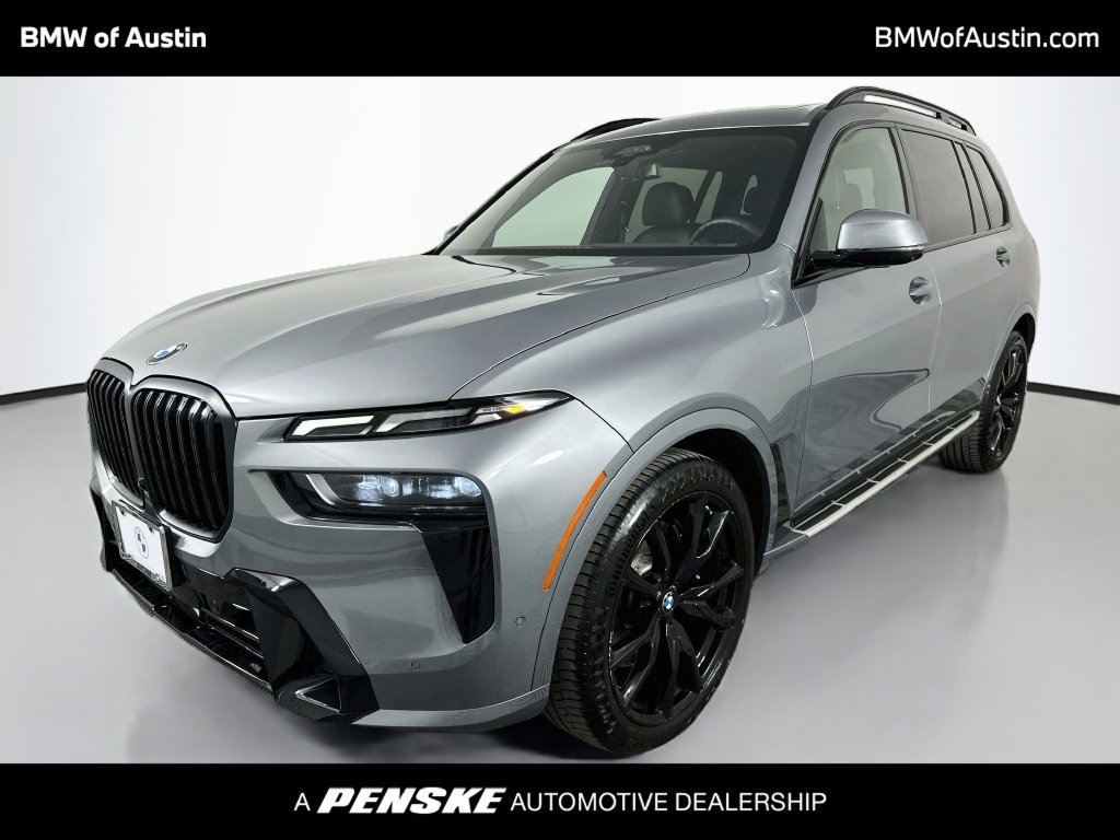 Used 2023 Skyscraper Grey Metallic BMW xDrive40i image 1