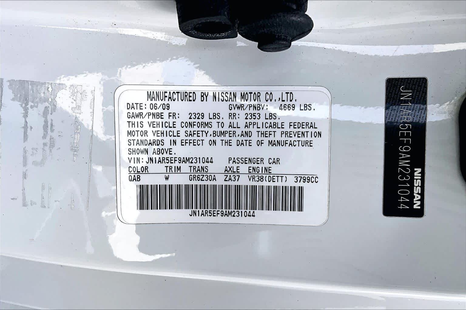 Used 2010 Pearl White Nissan Premium image 31