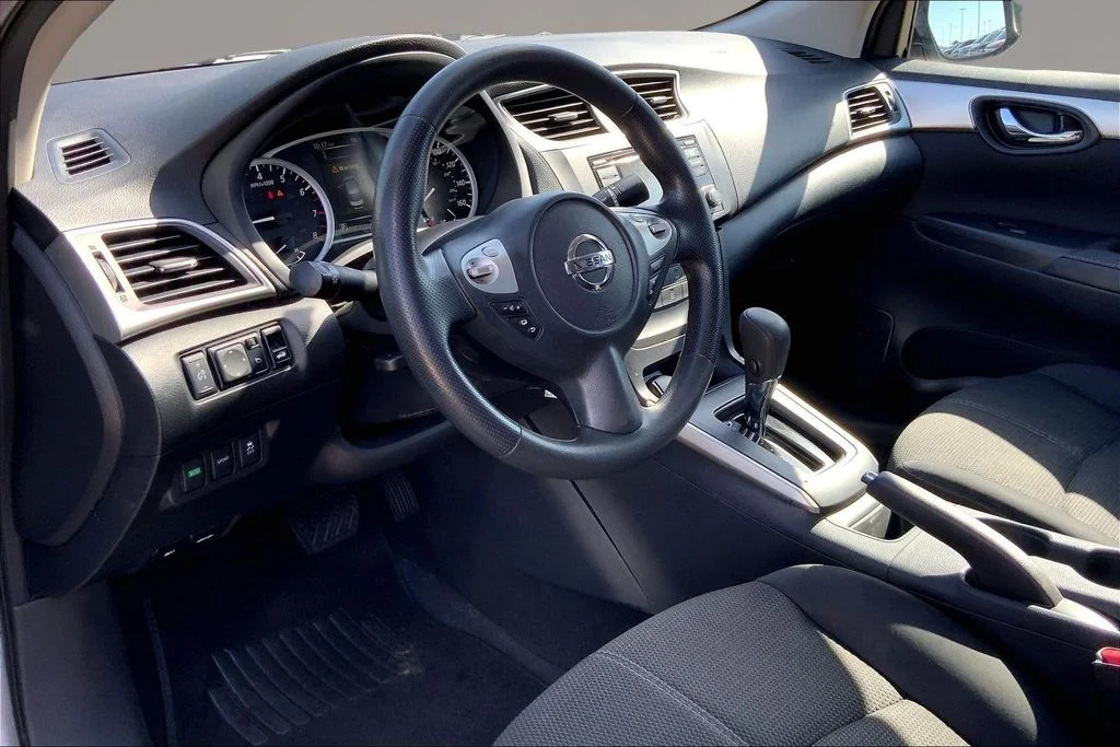 Used 2018 Brilliant Silver Metallic Nissan S image 13