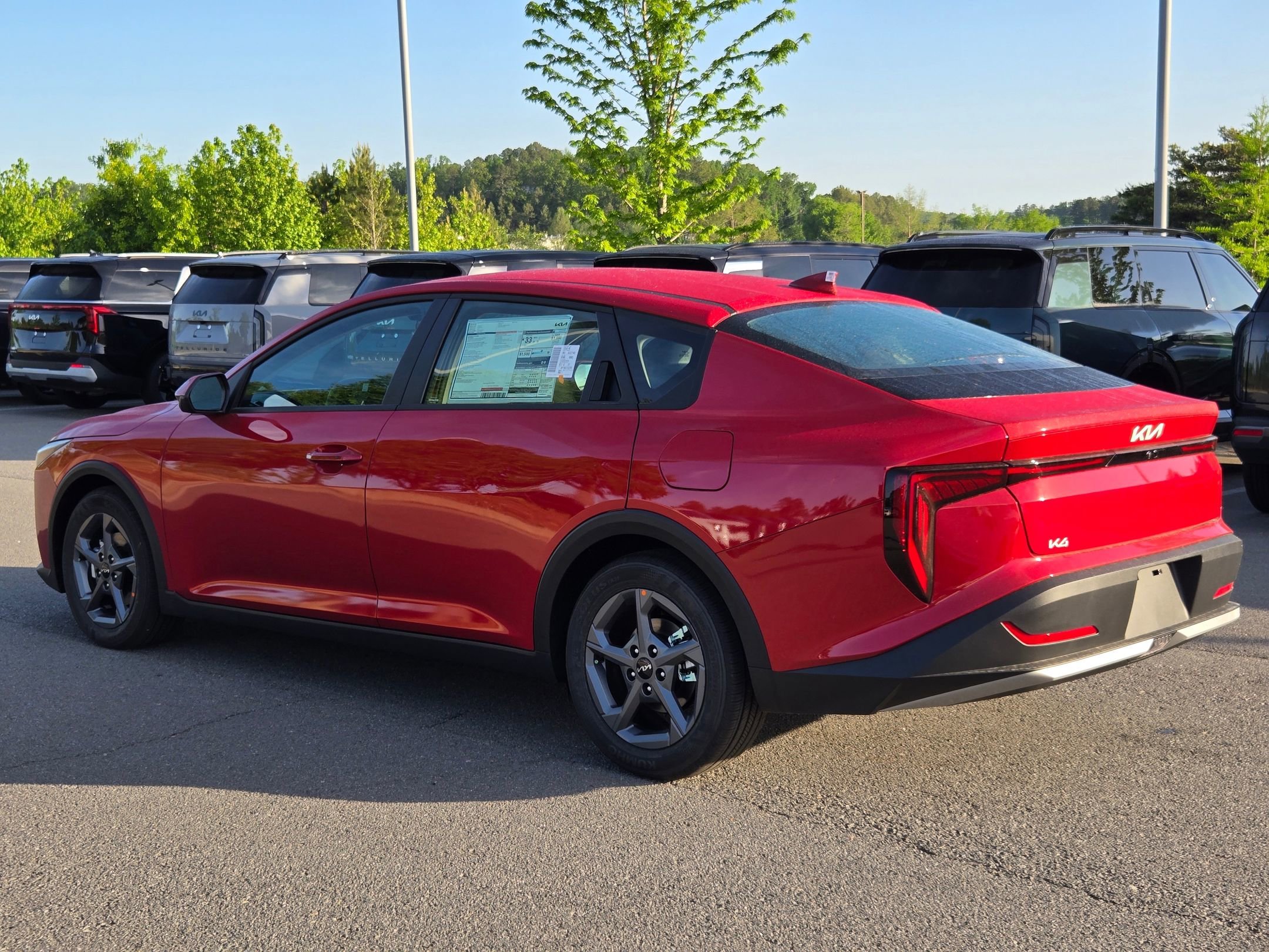 New 2026 Currant Red Kia LXS image 5
