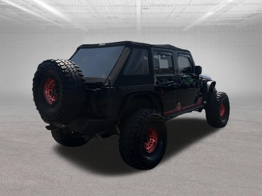 Used 2018 Black Jeep Unlimited Rubicon image 13