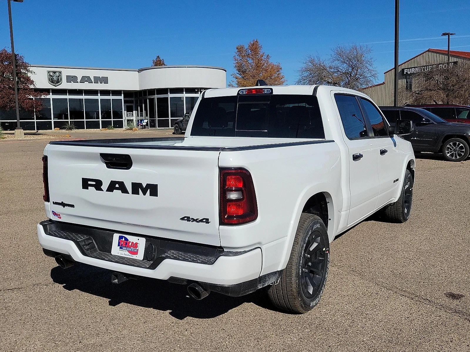 New 2026 PW7 Bright Whit Ram LONE STAR CREW CAB 4X4 5
