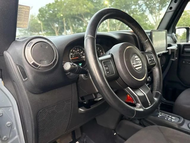 Used 2015 Gray Jeep Unlimited Sport image 25