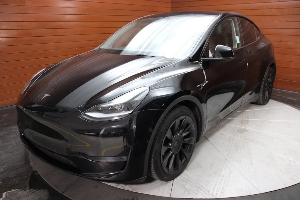 Used 2022 Solid Black Tesla Performance image 14