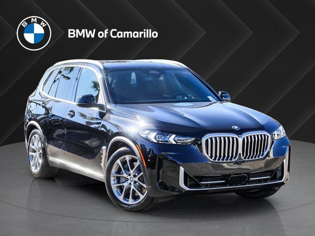New 2026 Black Sapphire Metallic BMW xDrive50e image 1