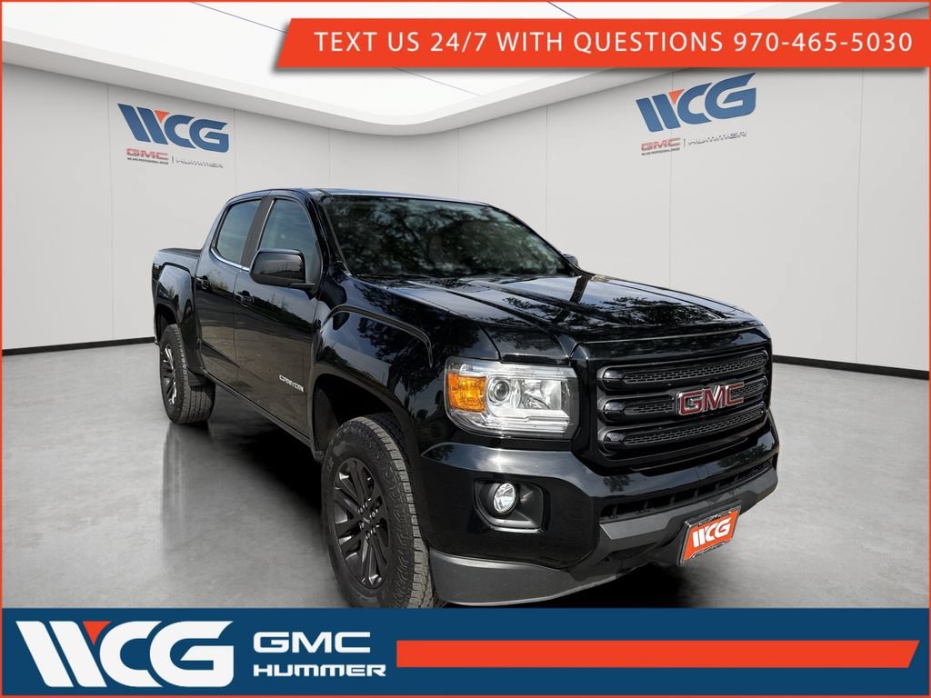 Used 2020 ONYX BLACK GMC 4WD SLE image 1