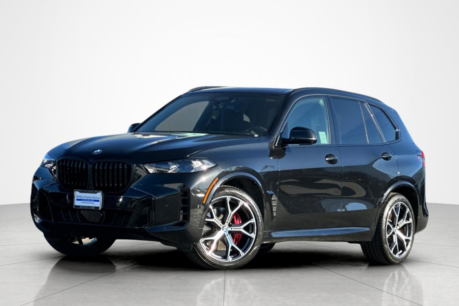Used 2024 Black Sapphire Metallic BMW sDrive40i image 1