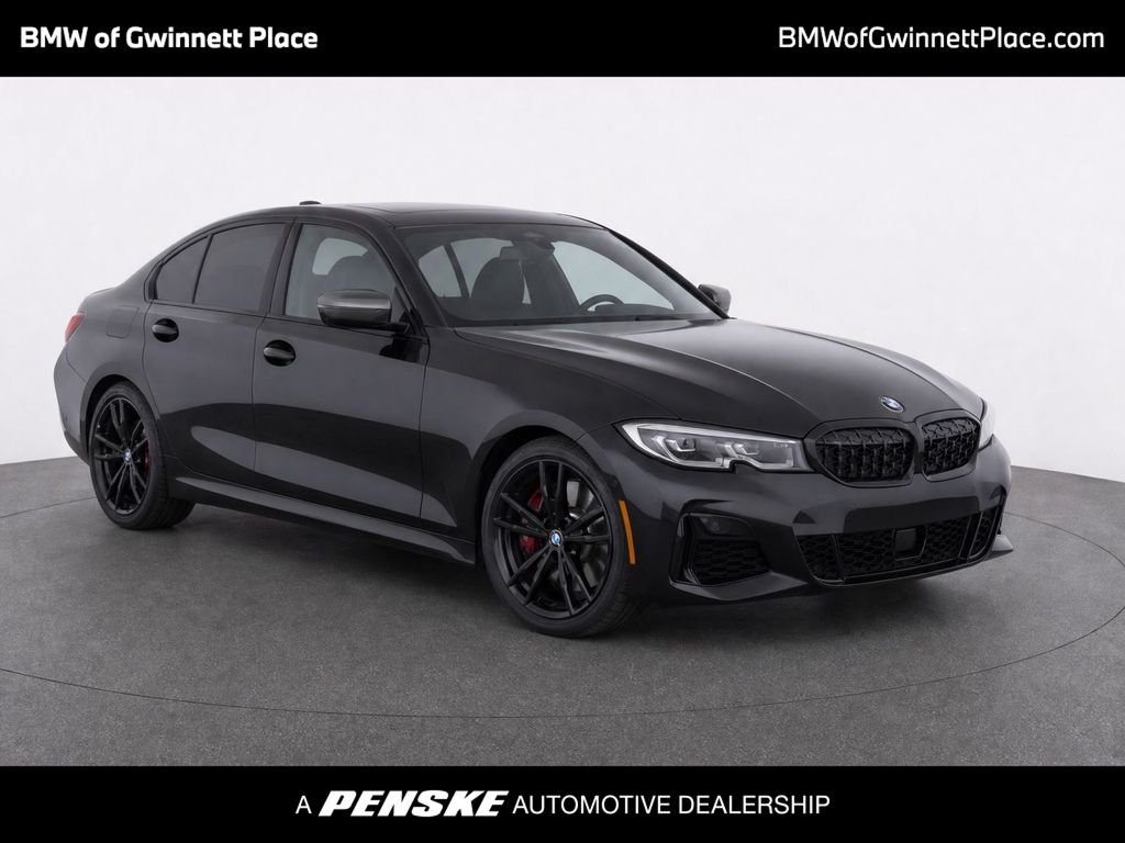 Used 2022 Black Sapphire Metallic BMW M340i image 1
