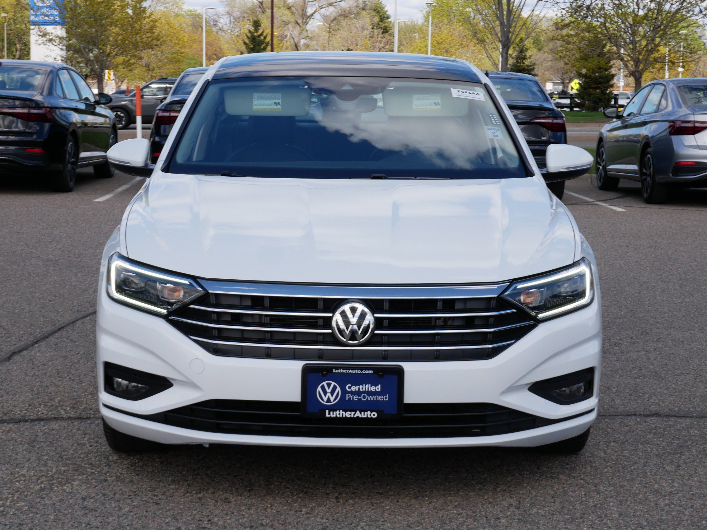 Certified 2021 Volkswagen Jetta SEL Premium with VIN 3VWG57BU8MM068071 for sale in Brooklyn Center, Minnesota