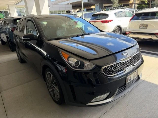 Used 2017 Black Kia Touring image 1