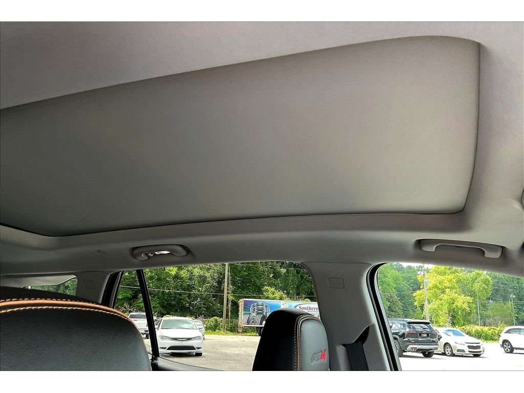 Used 2024 Ebony Twilight Metallic GMC AT4 image 15