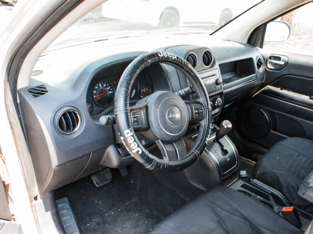 Used 2012 Bright Silver Metallic Clearcoat Jeep Sport image 8