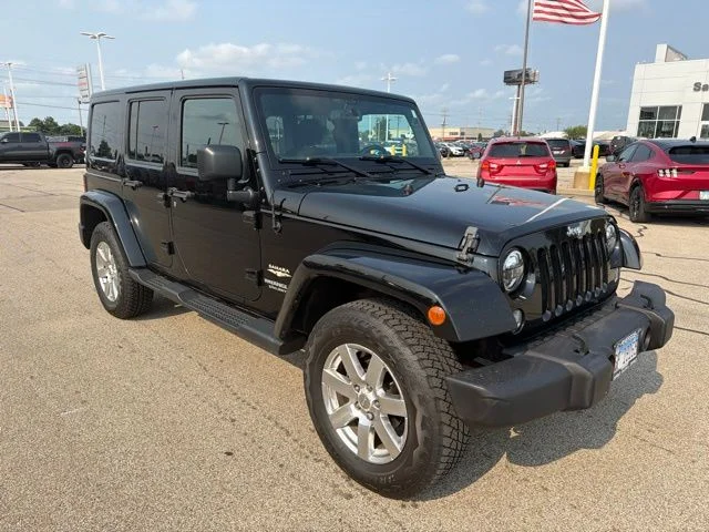 2015 Jeep Wrangler Unlimited Sahara for sale at Sam Leman Chrysler Jeep Dodge of Bloomington
