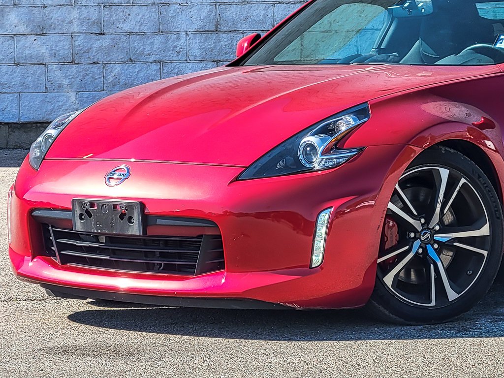Used 2018 Passion Red Nissan Touring Sport image 4