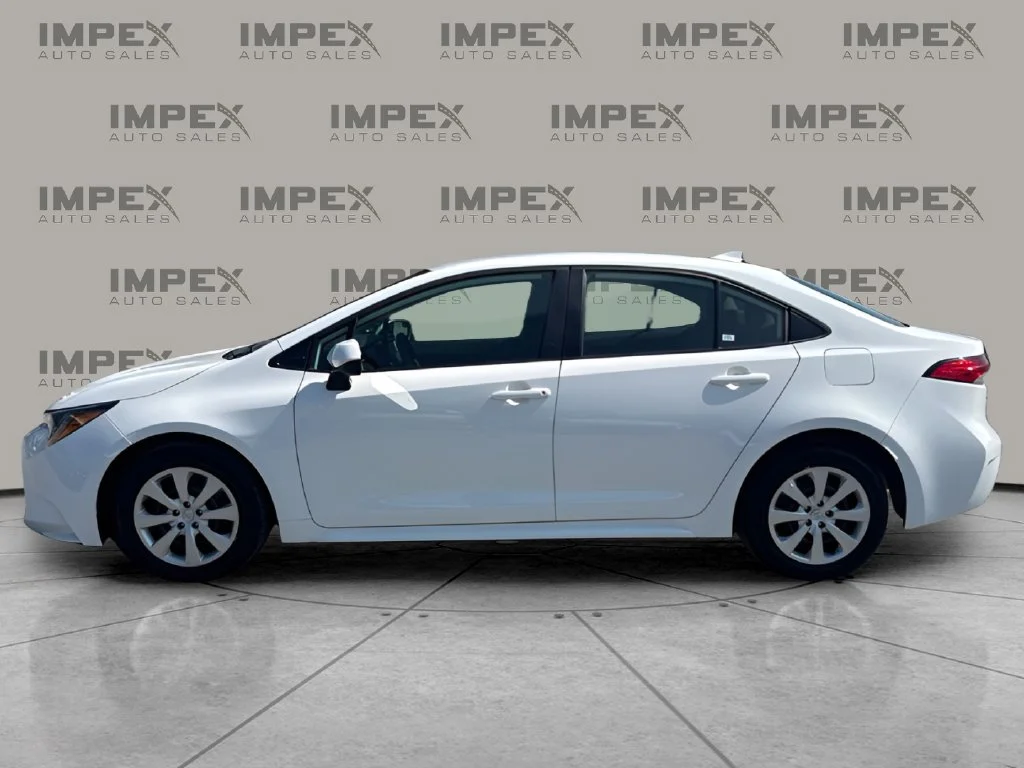 Used 2025 White Toyota LE image 2