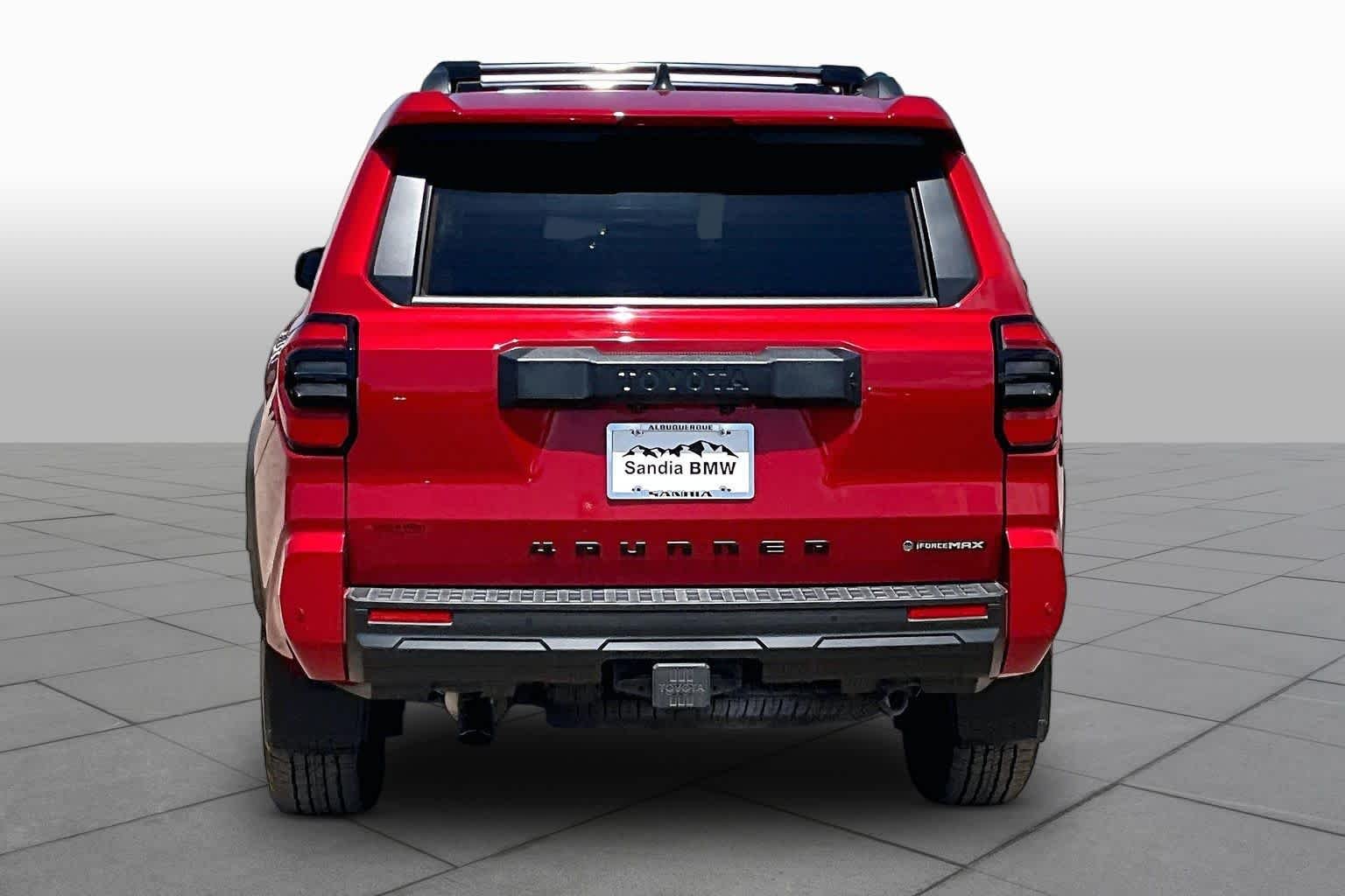 Used 2025 Supersonic Red Toyota Hybrid TRD Off Road Premium image 4
