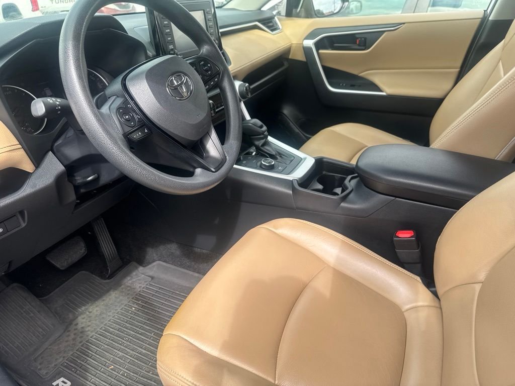 Used 2021 White Toyota LE image 1