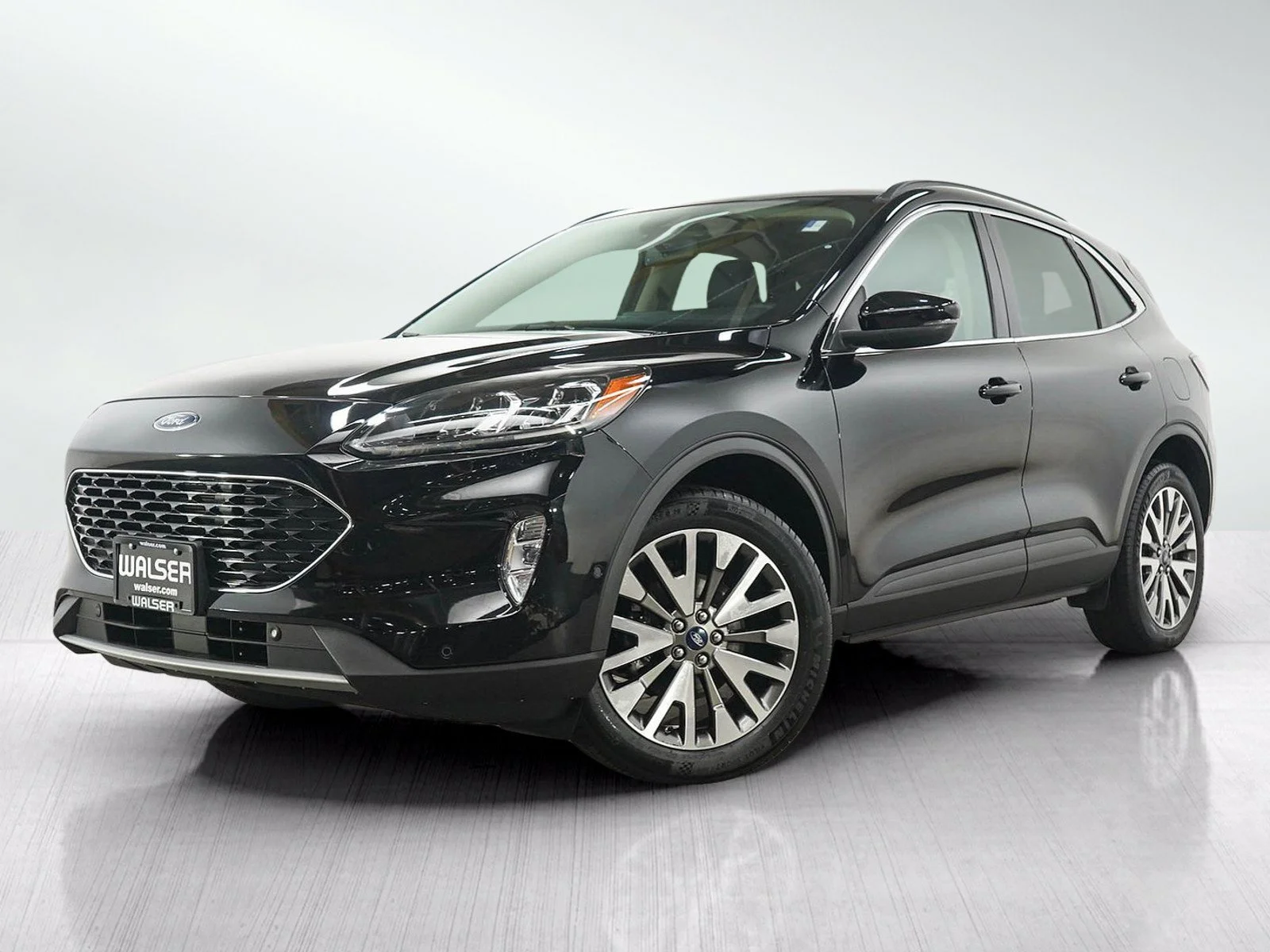 Used 2020 Black Metallic Ford Titanium image 1
