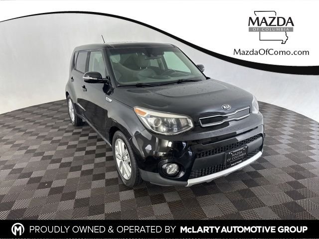 Used 2017 Black Kia Plus image 1